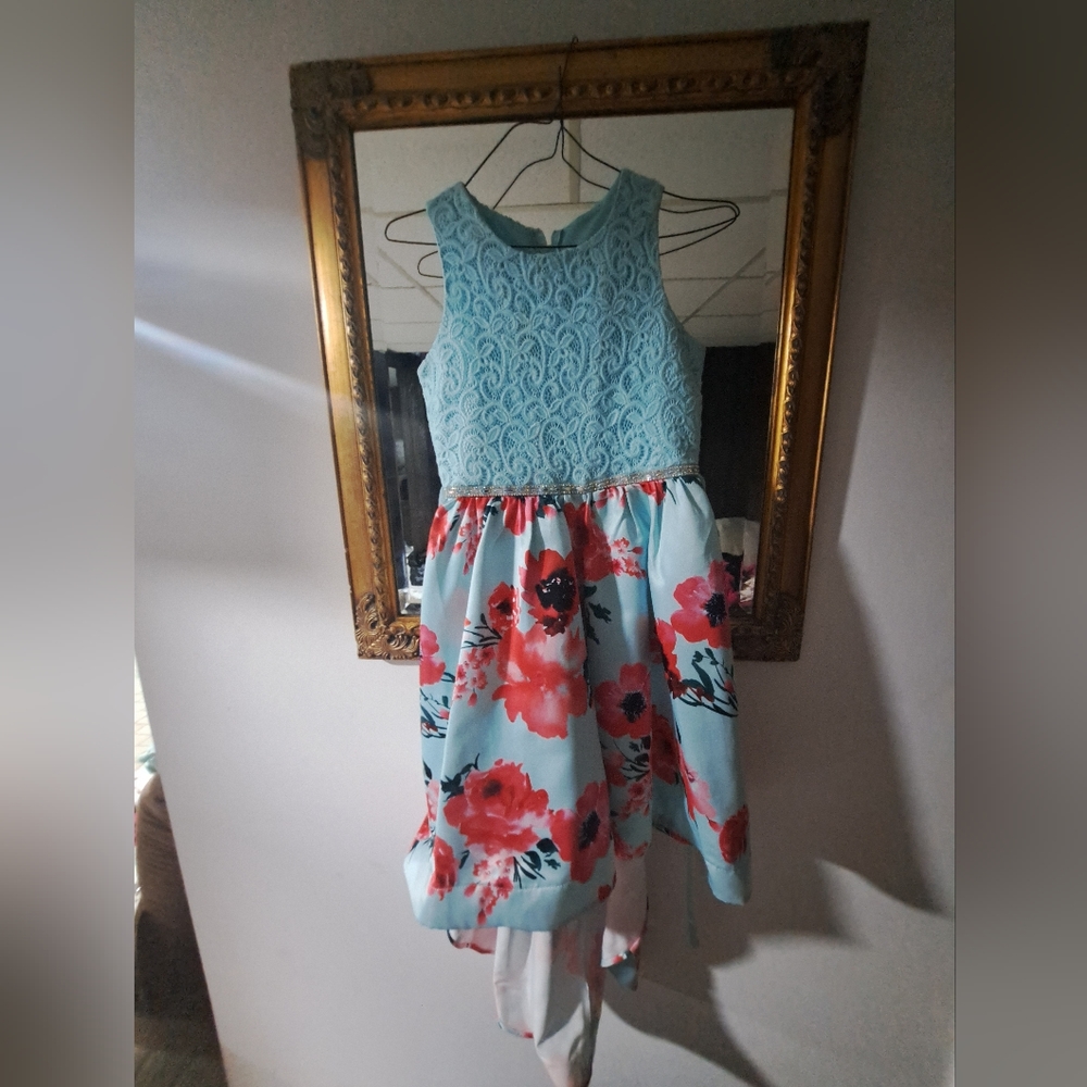 Rare edition Size 12 girl dresses with high low skirt.